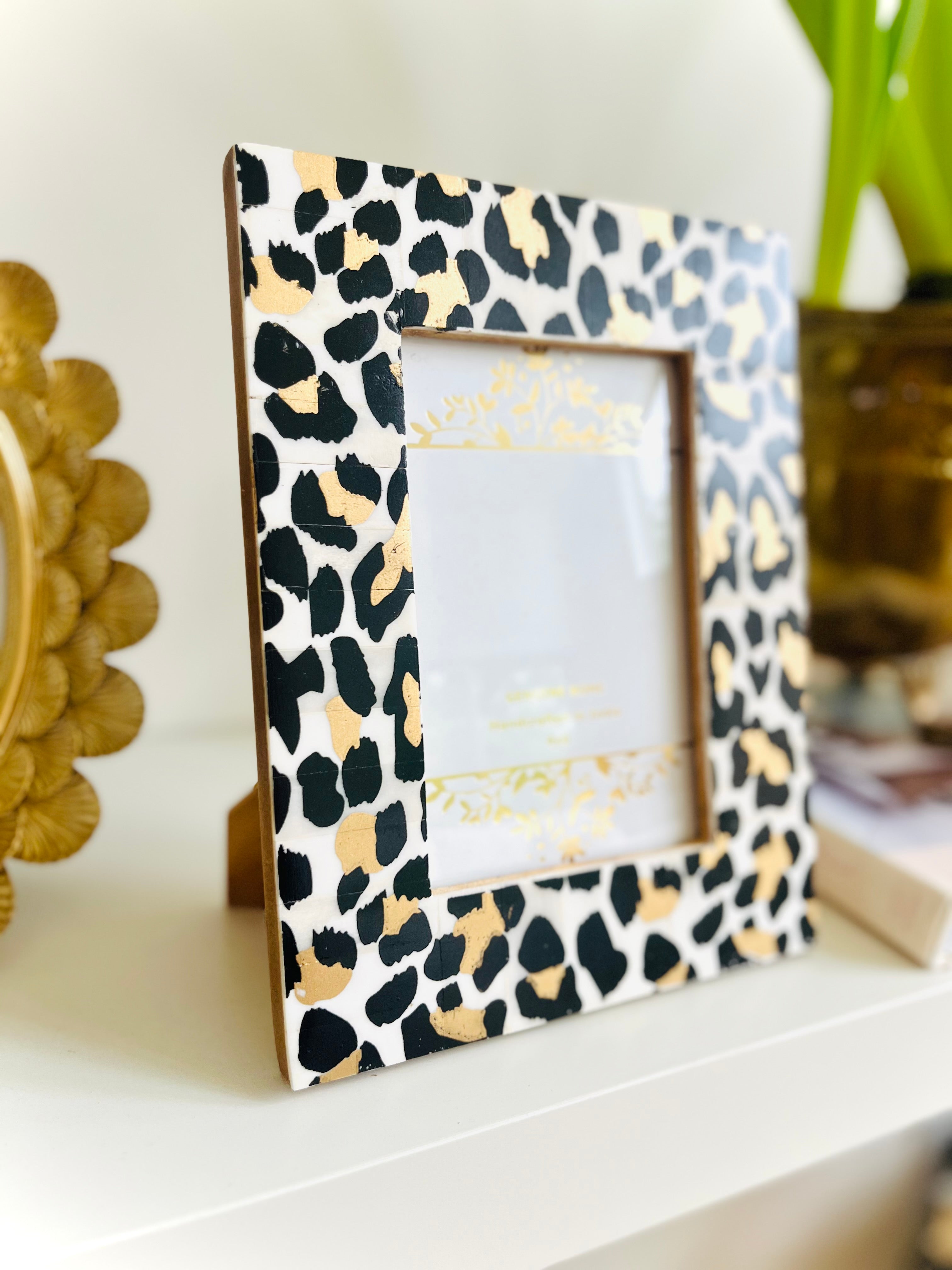 Leopard painted bone frame