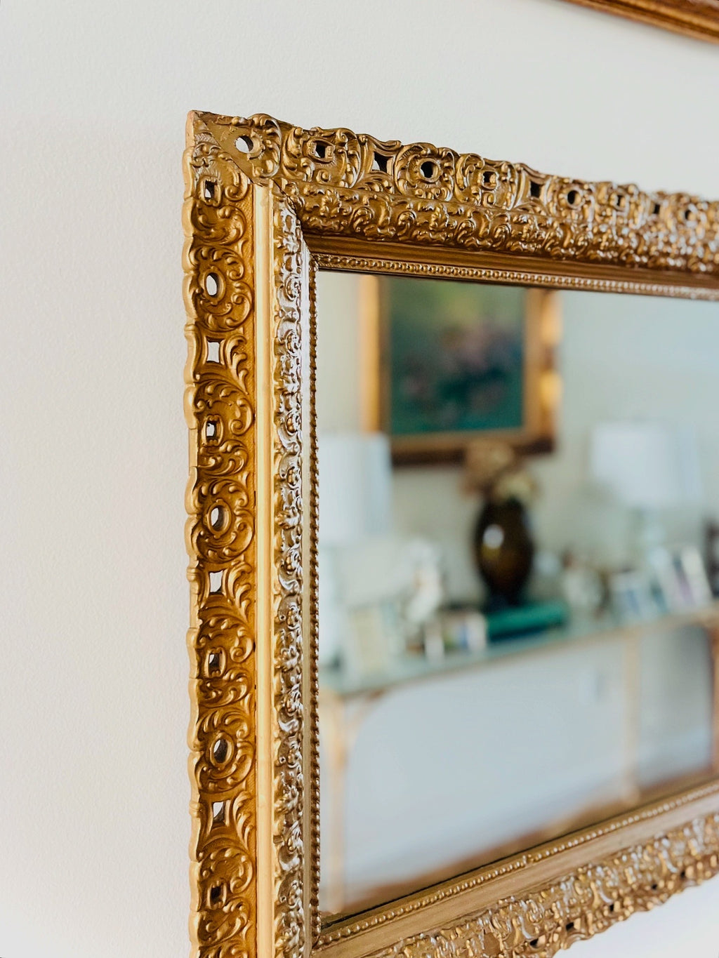 Gilded wooden wall mirror