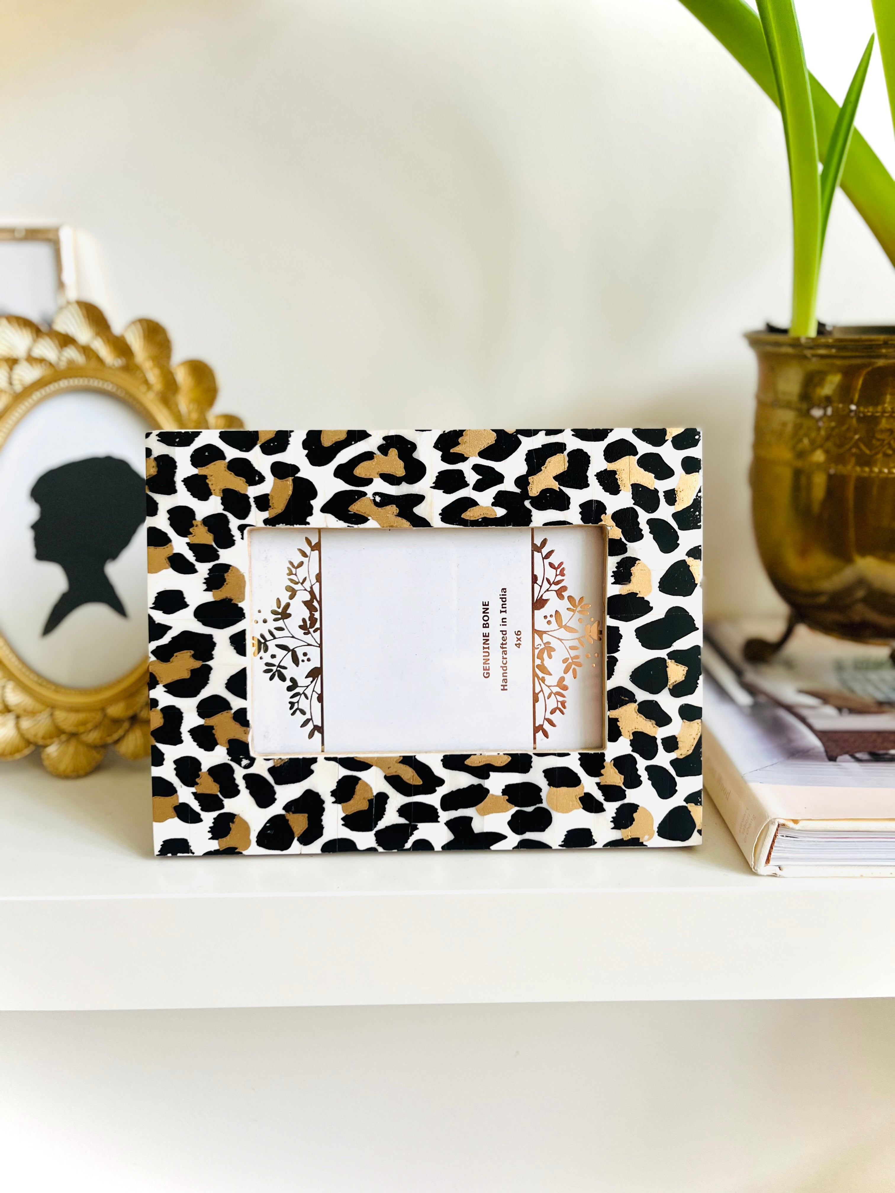 Leopard painted bone frame
