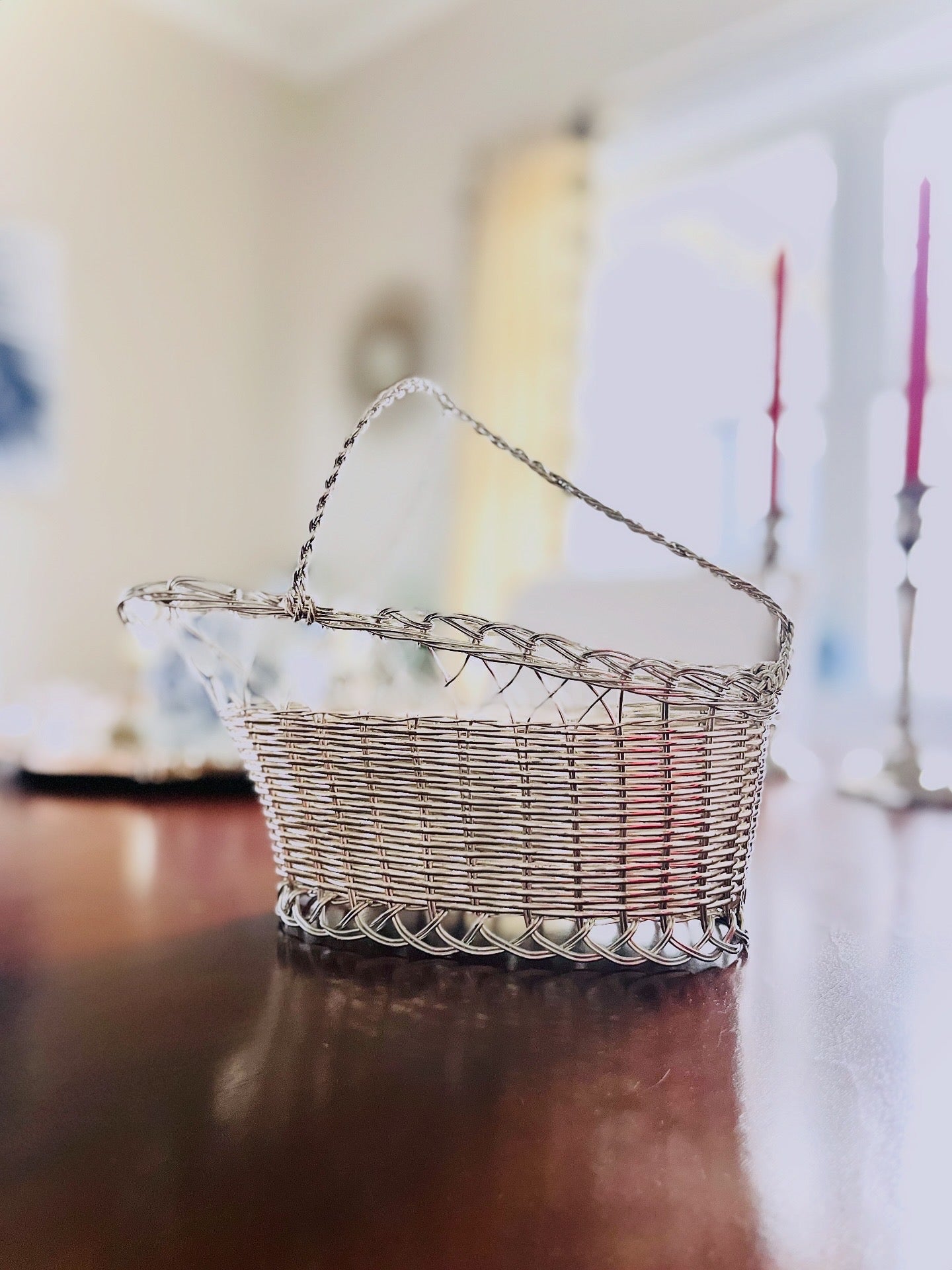 Silver toned wine bottle basket