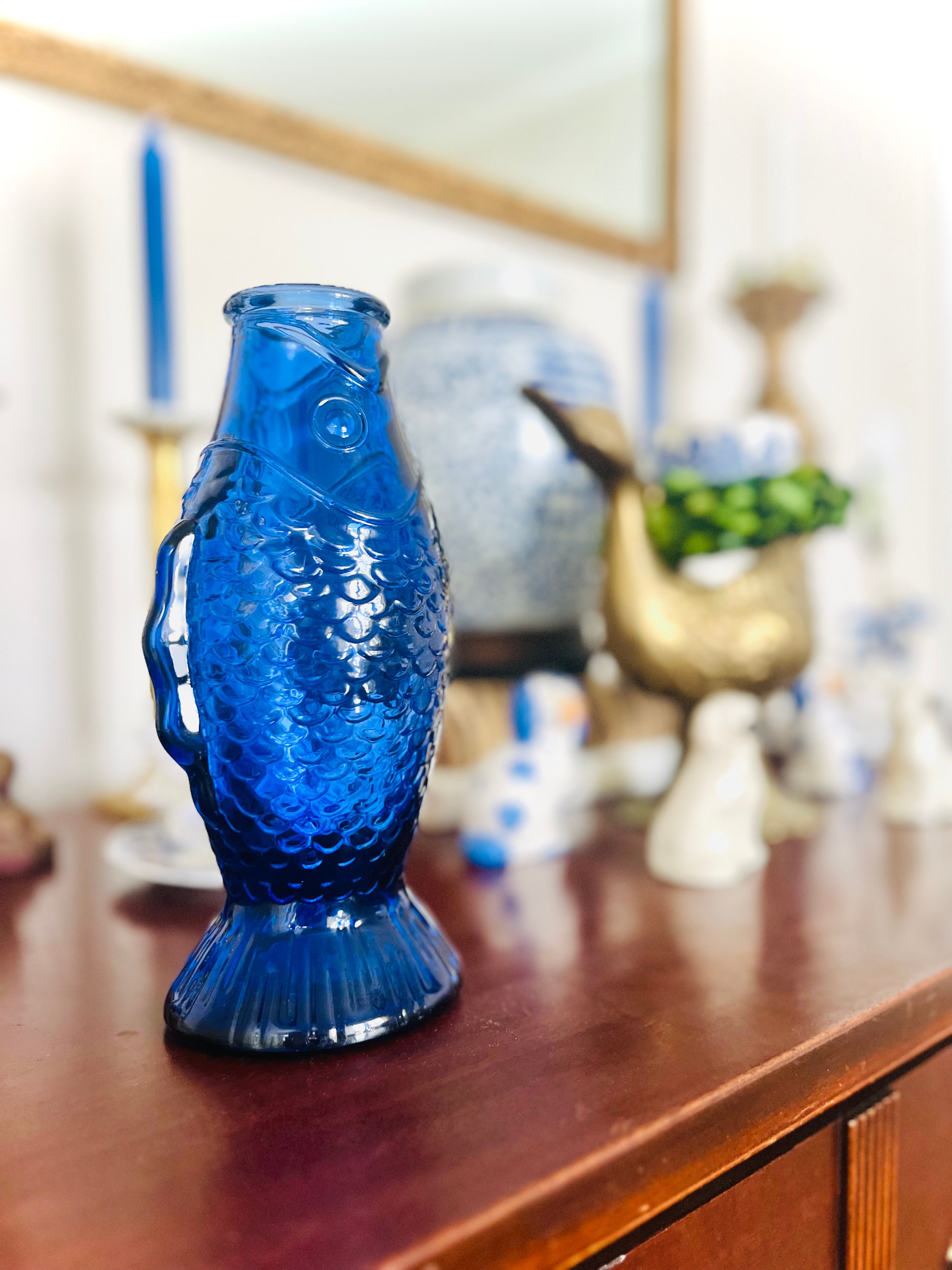 Blue glass fish vase