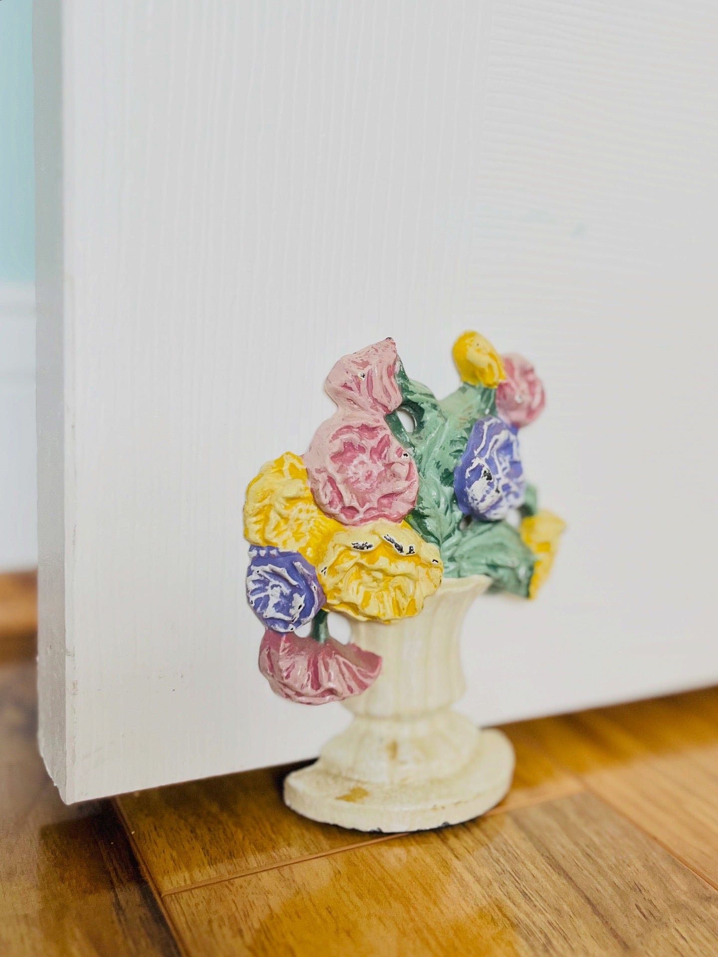Cast iron flower urn doorstop