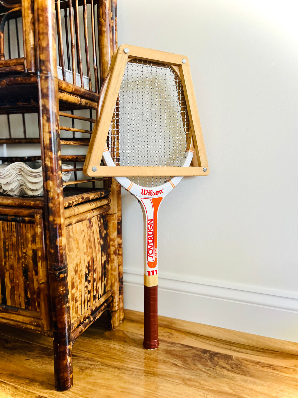 Wooden Wilson tennis racket