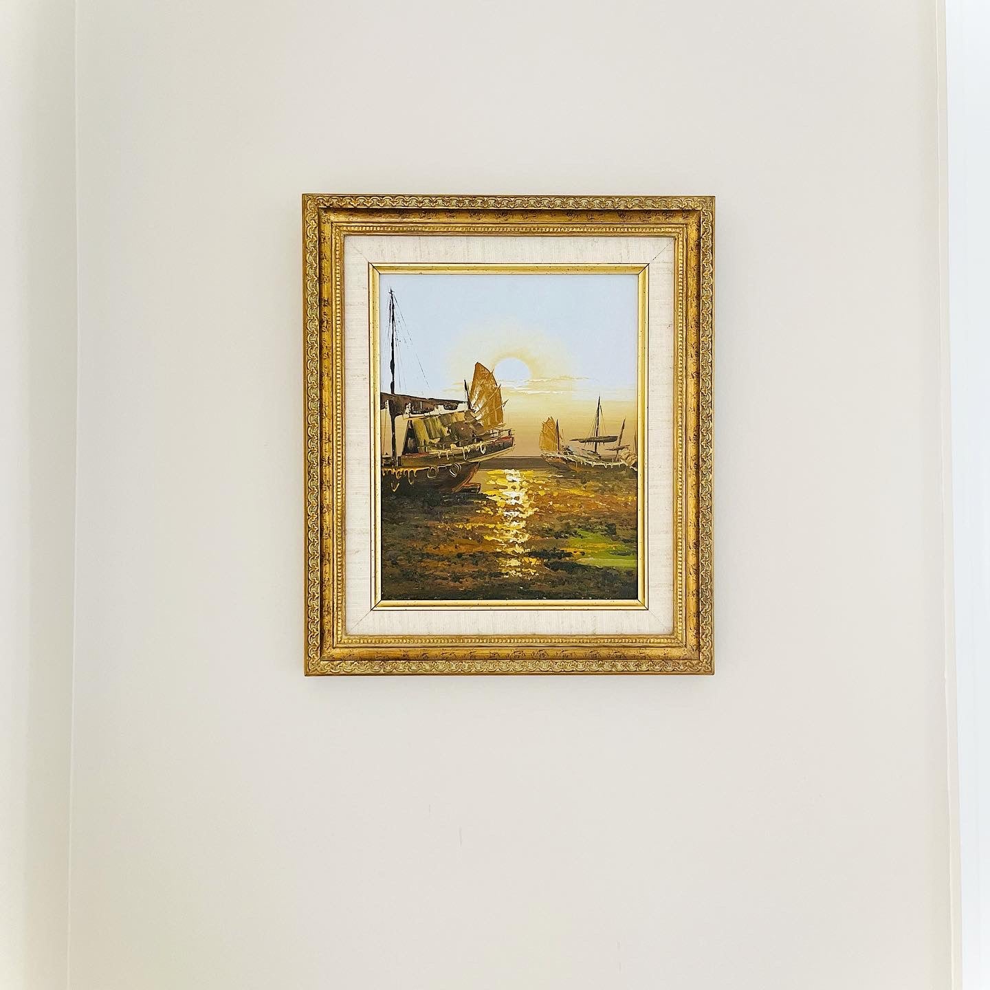 Framed oil on canvas of ships at sea