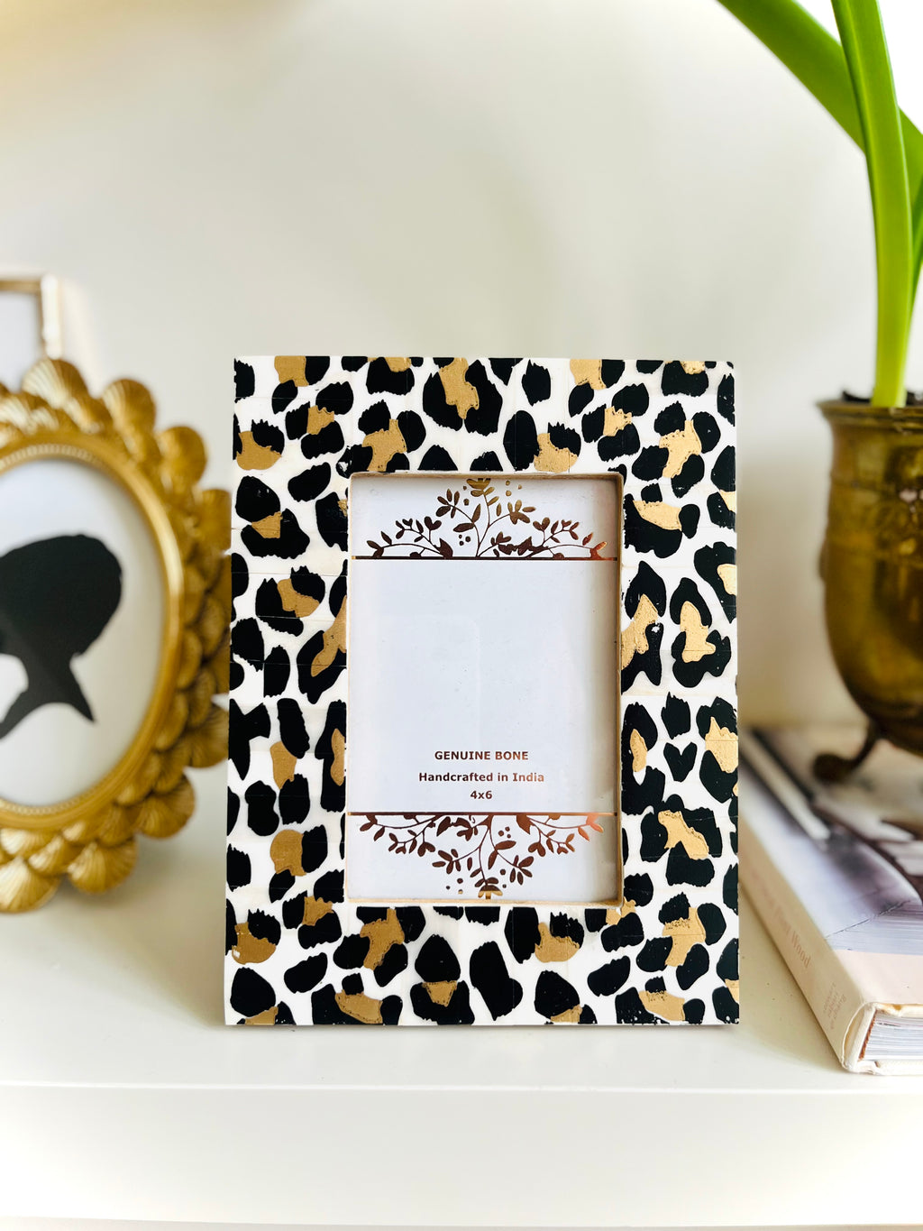 Leopard painted bone frame
