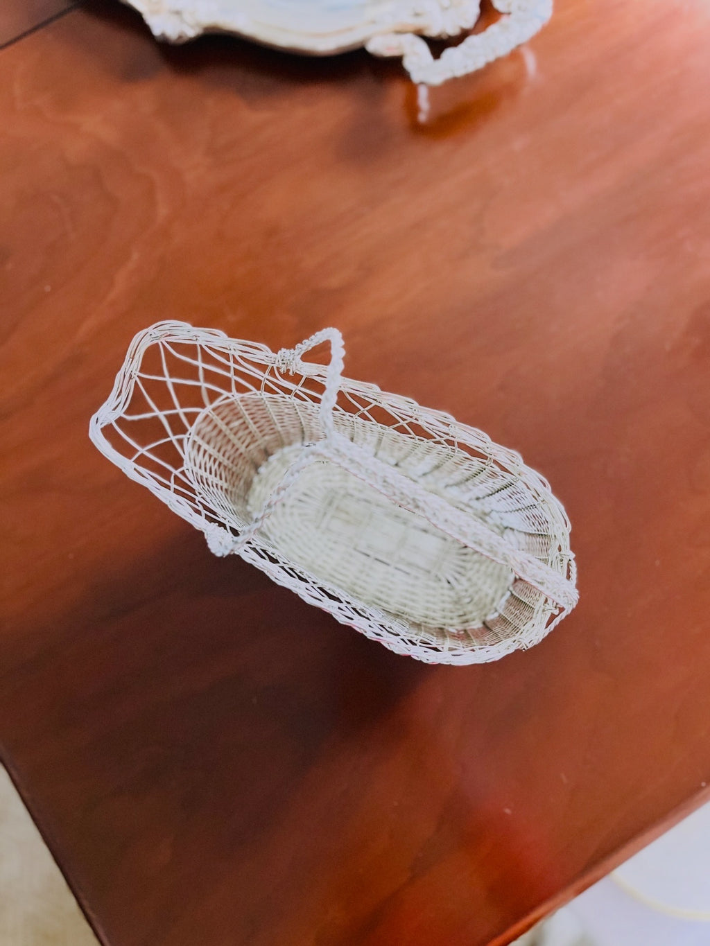Silver toned wine bottle basket