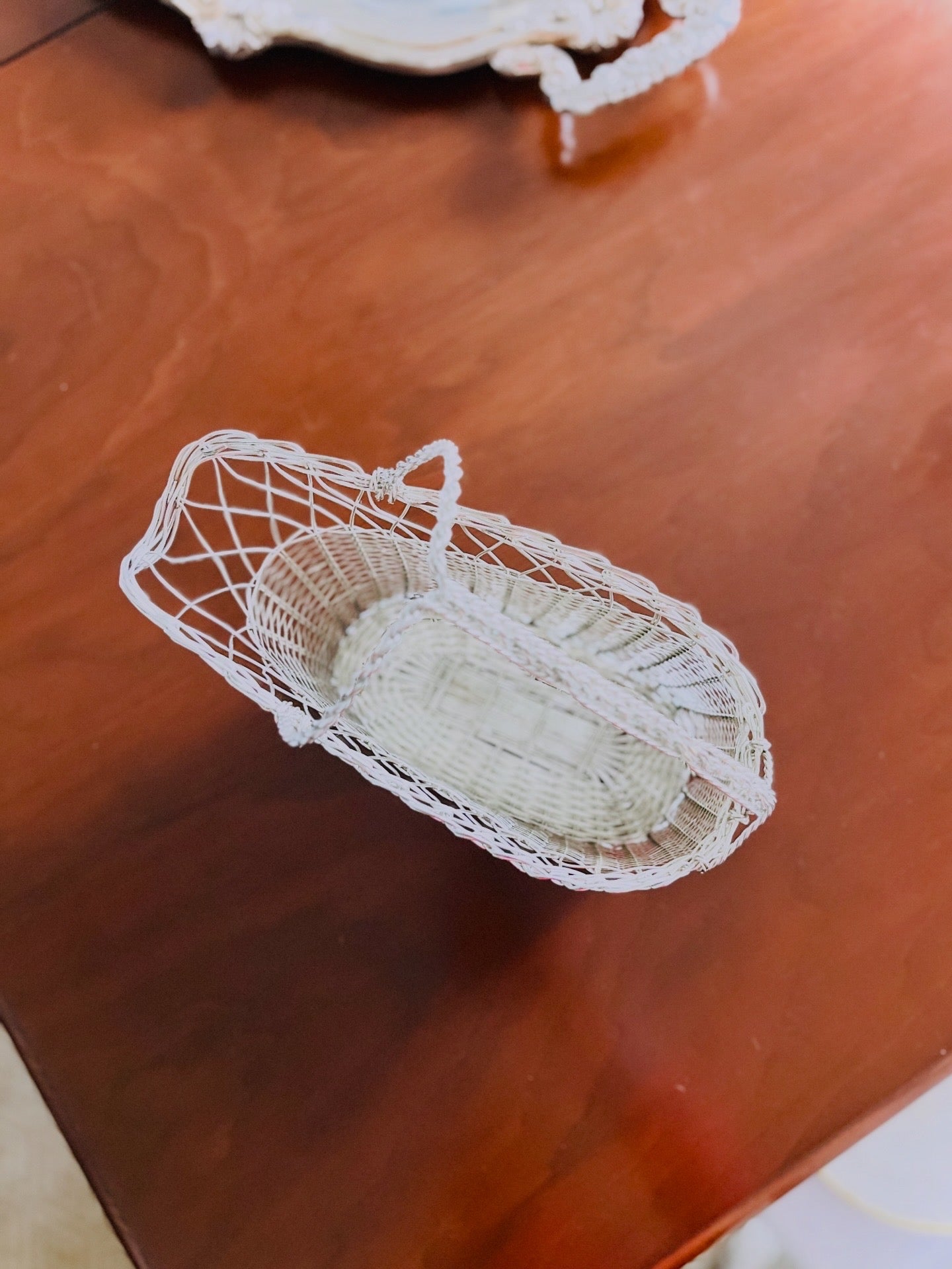 Silver toned wine bottle basket