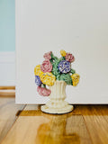 Cast iron flower urn doorstop